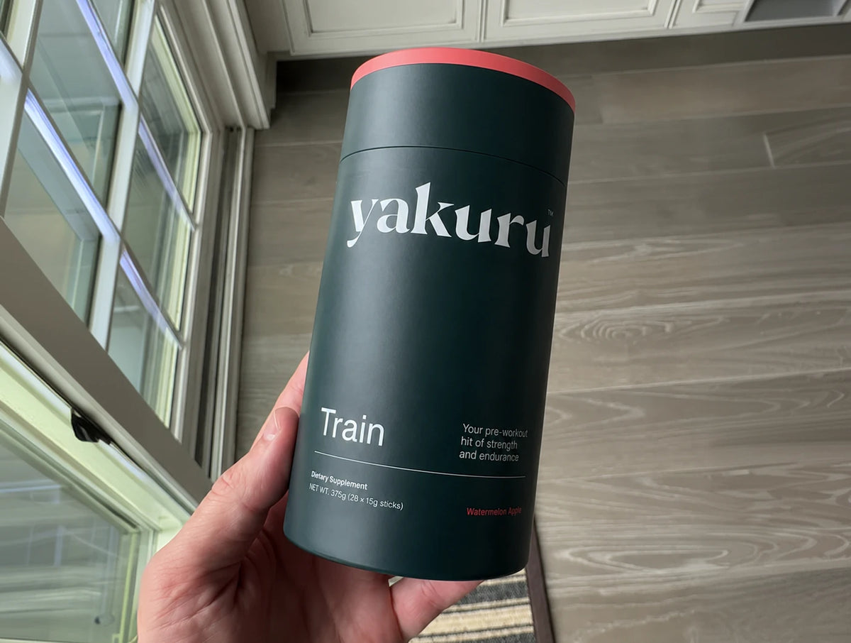 Hand holding a Yakuru Train canister
